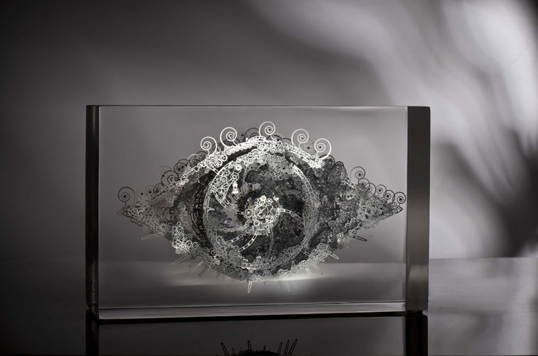 Lucite embedded stainless steel layered mechanical eye sculpture