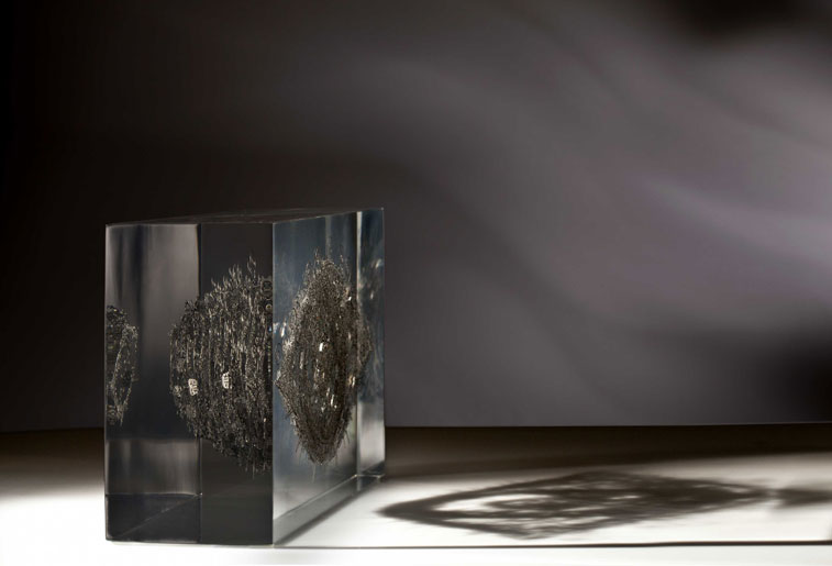 Lucite embedded stainless steel layered mechanical eye sculpture